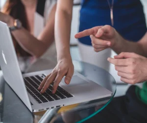 hands-pointing-laptop-scaled hands-pointing-laptop-scaled