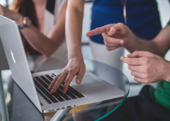 hands-pointing-laptop-scaled hands-pointing-laptop-scaled